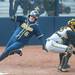 Michigan senior Ashley Lane scores a run after a freshman Kelsey Susalla hit a double during the sixth inning of their game against Iowa at Alumni field Saturday, April 20.
Courtney Sacco I AnnArbor.com